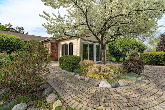 6228 Atkins Dr, Troy, MI 48085 - view of home's exterior with brick siding