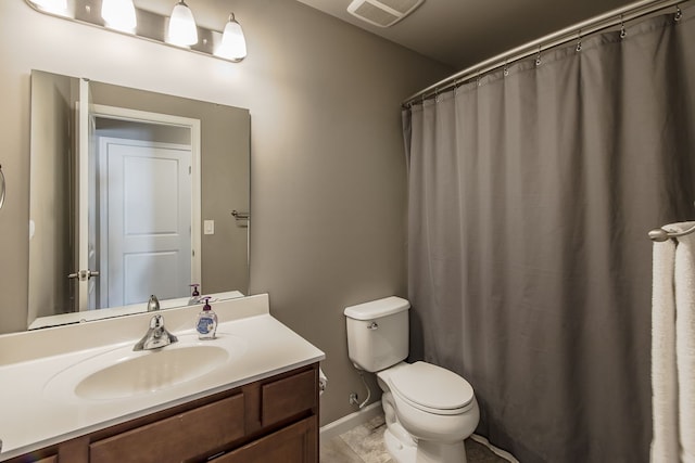 full bathroom featuring vanity, toilet, baseboards, and visible vents