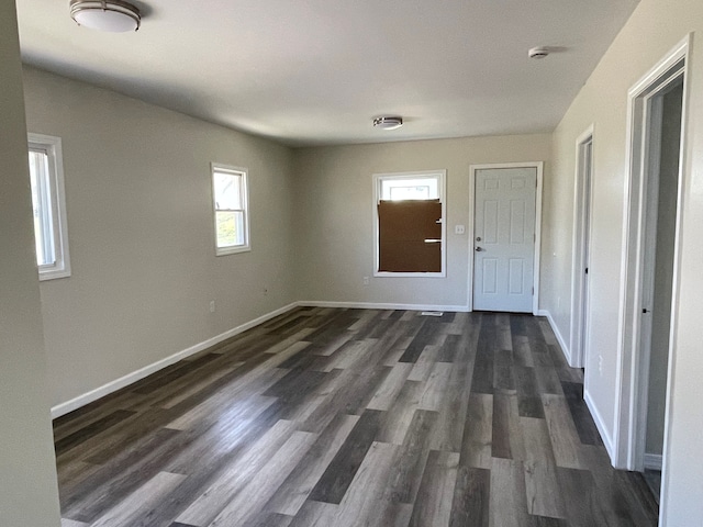 97 N Roselawn St, Pontiac, MI 48342 - interior space featuring baseboards and dark wood finished floors