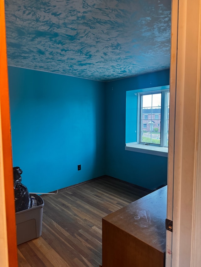 unfurnished room featuring wood finished floors