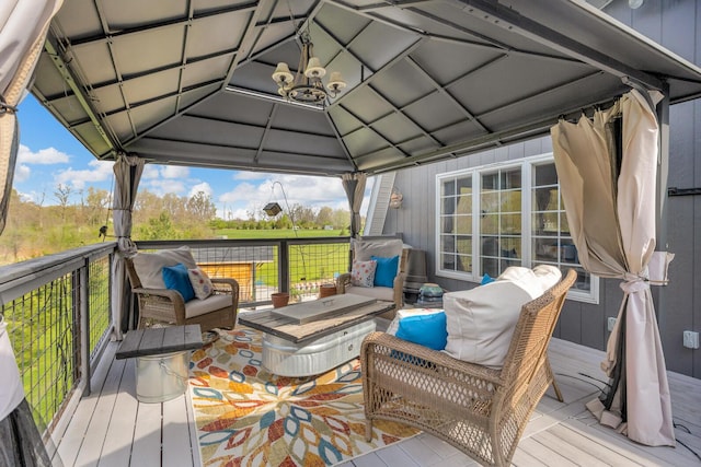 deck featuring an outdoor hangout area and a gazebo