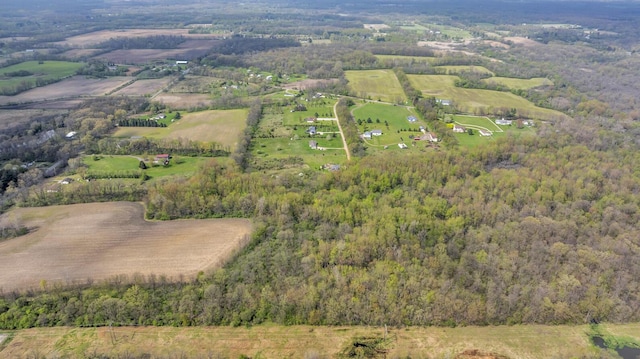 aerial view with a view of trees and a rural view