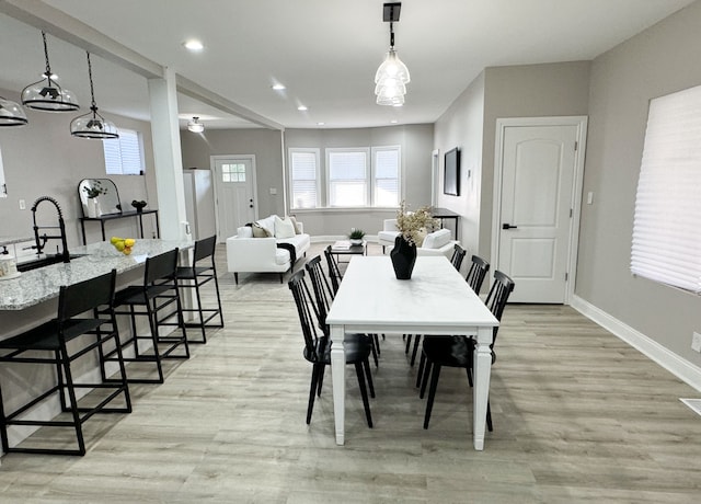 2439 Sheridan St, Detroit, MI 48214 - dining area with baseboards, recessed lighting, and light wood-style flooring