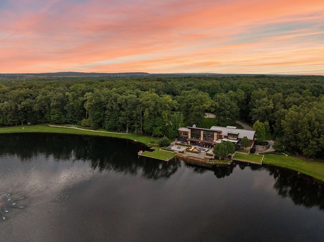 10463 W H Ave, Kalamazoo, MI 49009 - aerial view at dusk featuring a water view and a wooded view