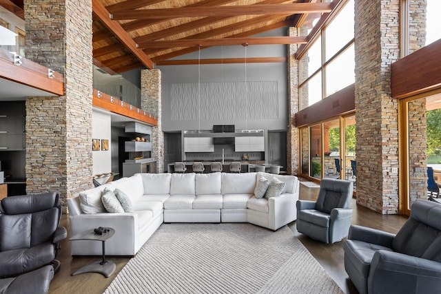10463 W H Ave, Kalamazoo, MI 49009 - living room with wood finished floors, high vaulted ceiling, and wooden ceiling