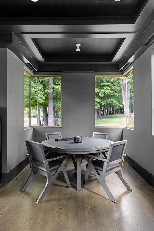 10463 W H Ave, Kalamazoo, MI 49009 - dining room with a raised ceiling and wood finished floors