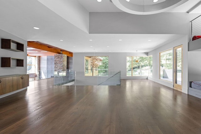 10463 W H Ave, Kalamazoo, MI 49009 - unfurnished living room featuring recessed lighting, a wealth of natural light, and wood finished floors