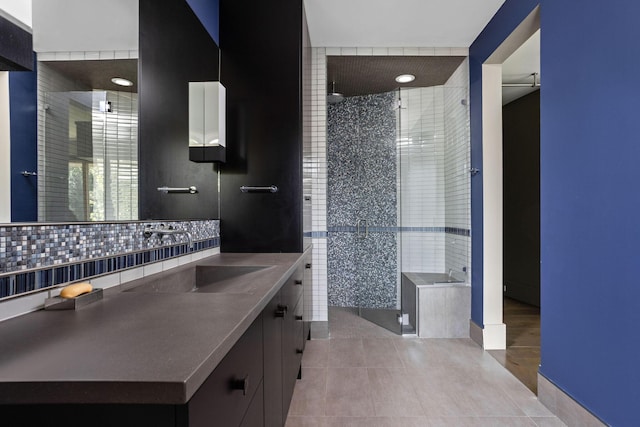 10463 W H Ave, Kalamazoo, MI 49009 - full bath featuring backsplash, a walk in shower, tile patterned floors, and vanity