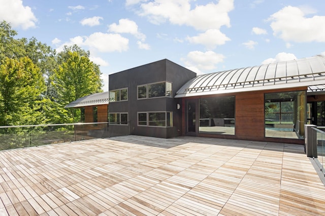 10463 W H Ave, Kalamazoo, MI 49009 - exterior space featuring a balcony, metal roof, and a standing seam roof