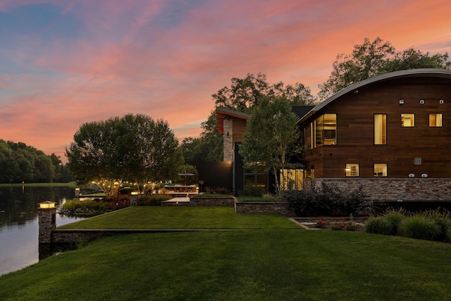 10463 W H Ave, Kalamazoo, MI 49009 - yard at dusk featuring a water view