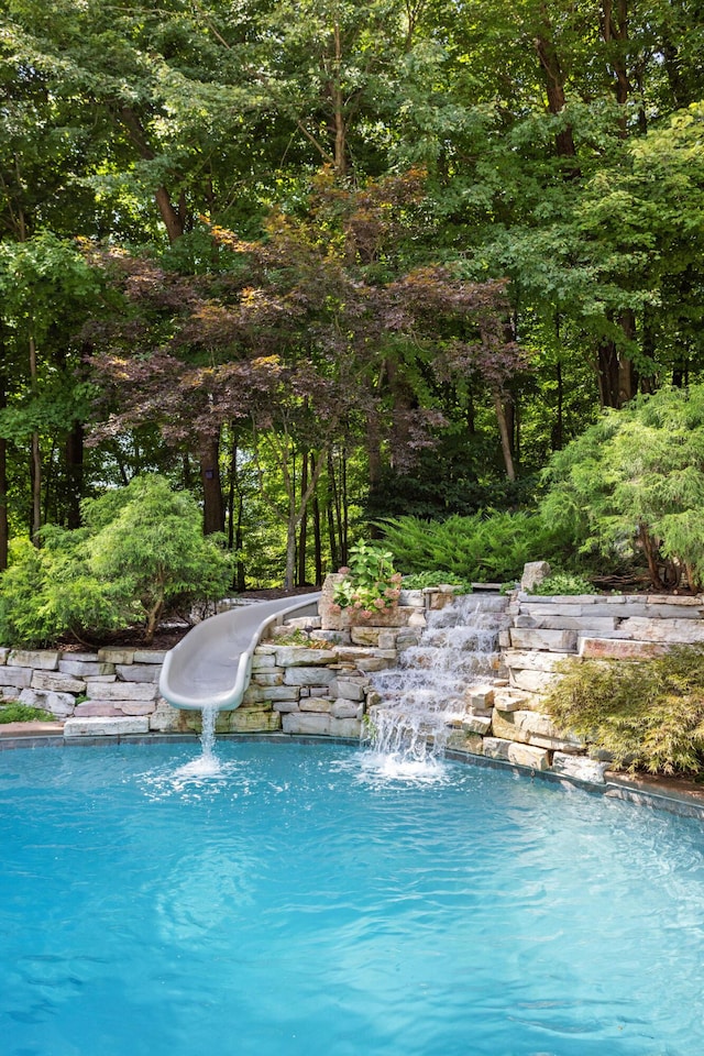 10463 W H Ave, Kalamazoo, MI 49009 - view of swimming pool with a water slide