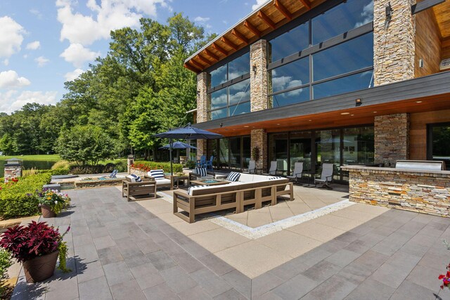 10463 W H Ave, Kalamazoo, MI 49009 - view of patio featuring an outdoor living space and area for grilling
