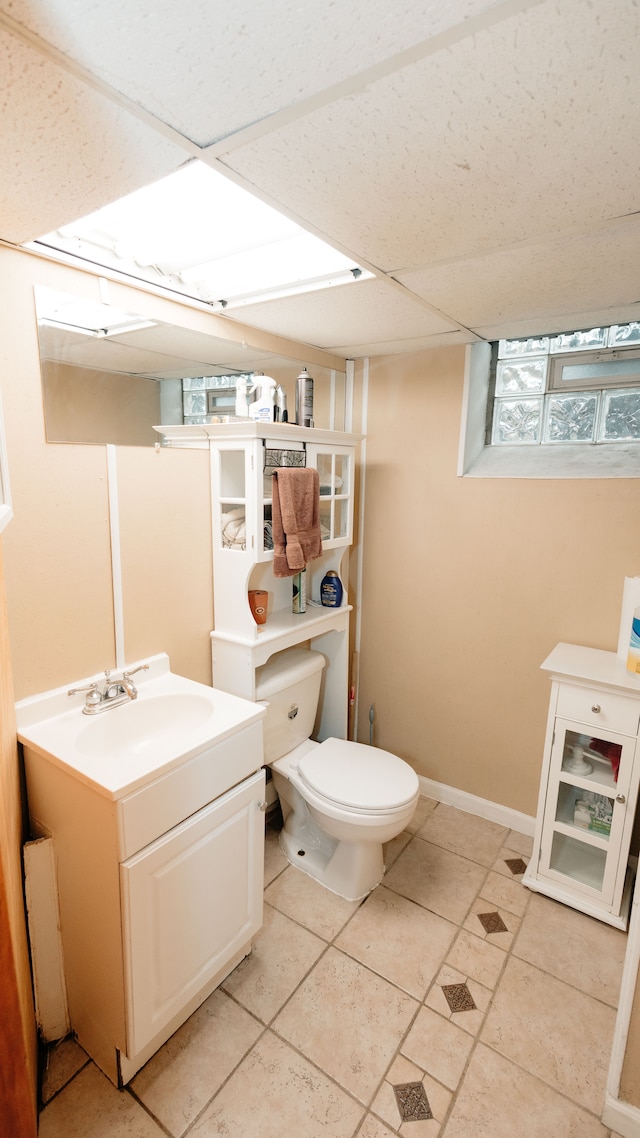 15261 Demean Ave, Allen Park, MI 48101 - bathroom featuring vanity, toilet, and tile patterned flooring