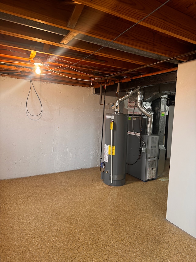 unfinished basement with water heater and heating unit