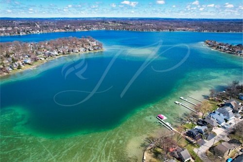 bird's eye view with a residential view and a water view