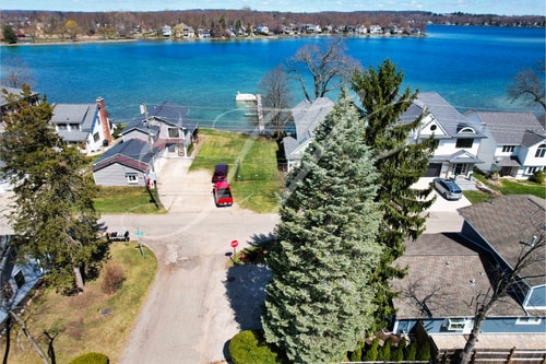 aerial view with a water view and a residential view