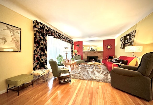 9186 Arnold St, Redford, MI 48239 - living room with wood finished floors and a fireplace