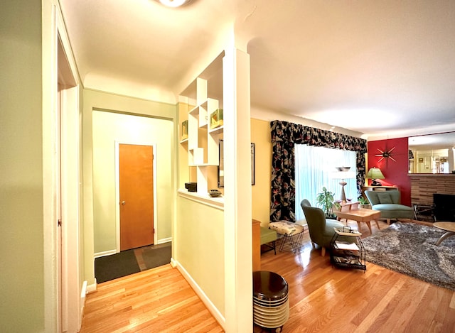 9186 Arnold St, Redford, MI 48239 - corridor featuring wood finished floors and baseboards