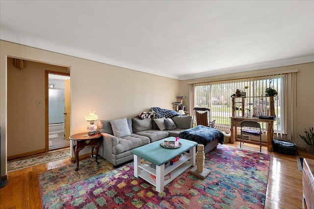 2180 Vernier Rd, Grosse Pointe Woods, MI 48236 - living room with baseboards and wood finished floors