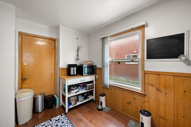 2180 Vernier Rd, Grosse Pointe Woods, MI 48236 - interior space with wood walls, wainscoting, plenty of natural light, and wood finished floors