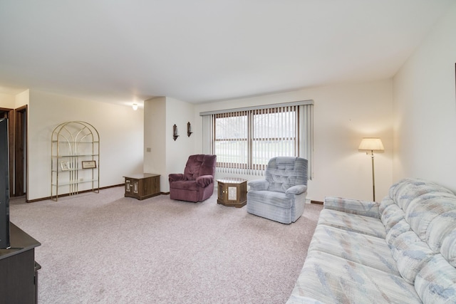 living room with carpet floors and baseboards