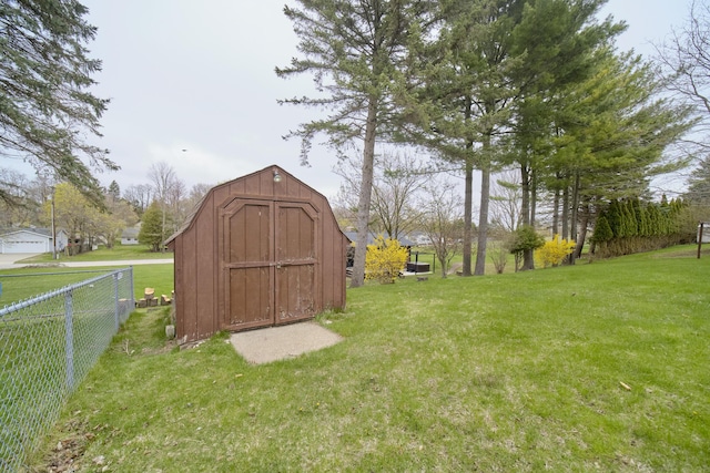 view of shed with fence