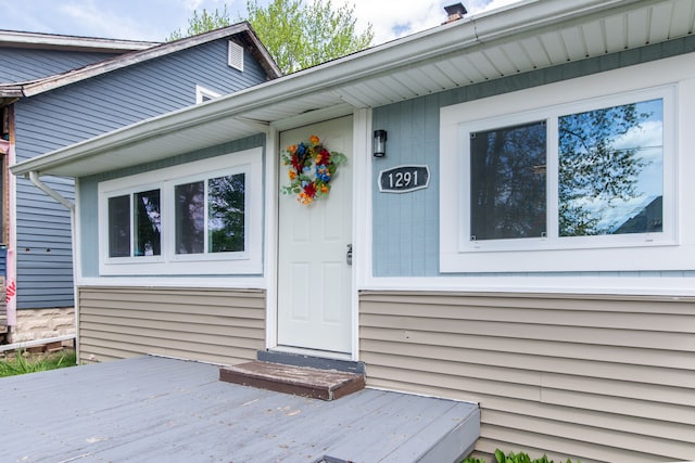 1291 E Lake Dr, Novi, MI 48377 - property entrance with a wooden deck