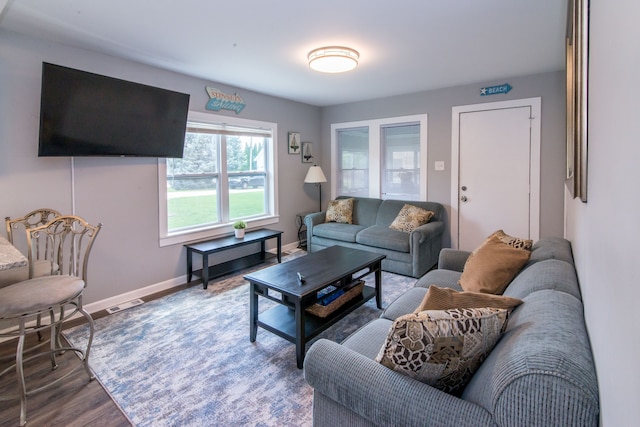 1291 E Lake Dr, Novi, MI 48377 - living room featuring wood finished floors and baseboards
