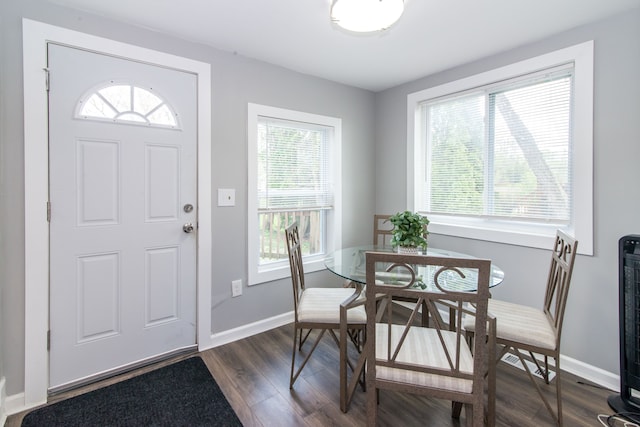 1291 E Lake Dr, Novi, MI 48377 - dining space with dark wood-style flooring and baseboards
