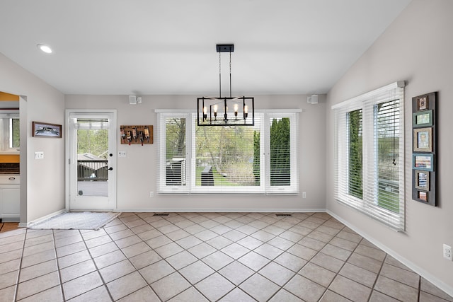 1095 Oregon Blvd, Waterford, MI 48327 - unfurnished dining area featuring an inviting chandelier, light tile patterned floors, baseboards, and recessed lighting
