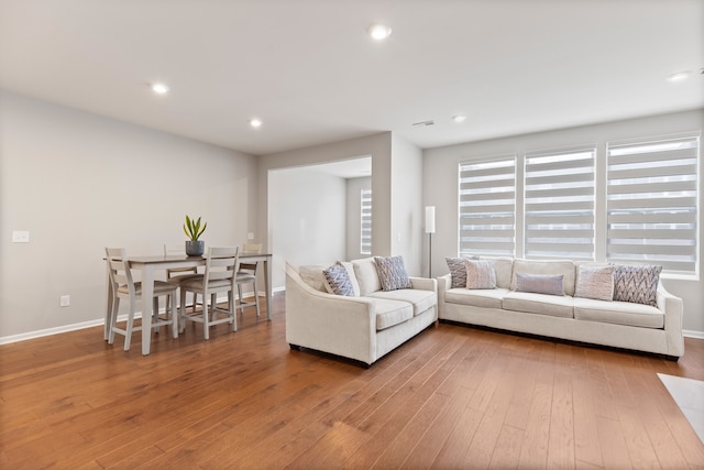 4867 Glenora Dr, Lake Orion, MI 48359 - living room featuring wood-type flooring, baseboards, and recessed lighting