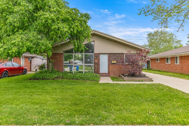 4938 Lincoln Blvd, Dearborn Heights, MI 48125 - view of front of property with a front lawn and brick siding
