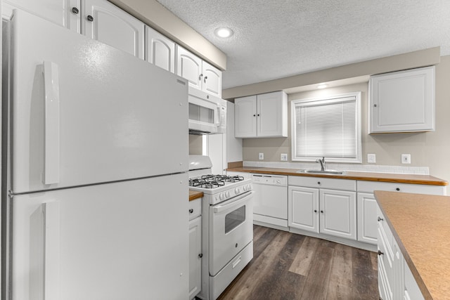 4938 Lincoln Blvd, Dearborn Heights, MI 48125 - kitchen with white appliances, a sink, white cabinetry, dark wood finished floors, and a textured ceiling