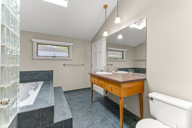 4938 Lincoln Blvd, Dearborn Heights, MI 48125 - full bathroom featuring toilet, a garden tub, vaulted ceiling, double vanity, and tile patterned floors