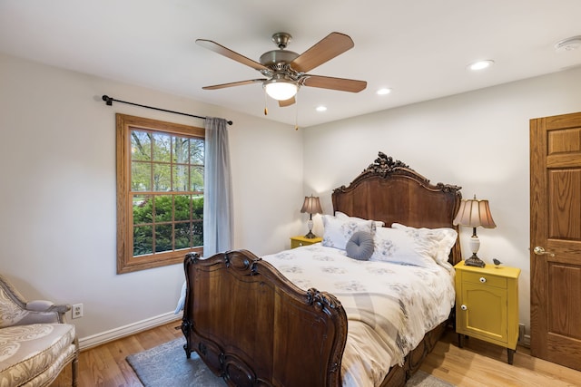 bedroom featuring light wood finished floors, baseboards, a ceiling fan, and recessed lighting