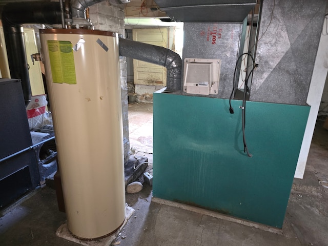 1315 Mitchell St, Jackson, MI 49203 - utility room with heating unit and water heater