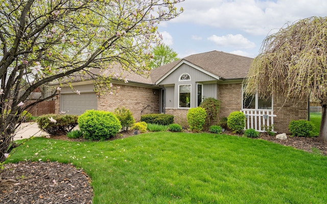 ranch-style home featuring a front yard, brick siding, fence, an attached garage, and a shingled roof