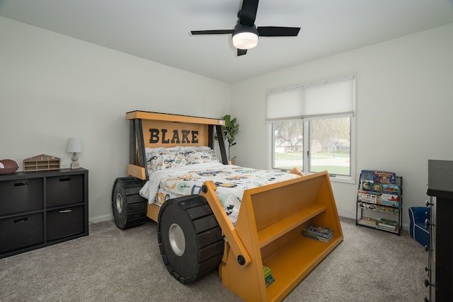 carpeted bedroom featuring a ceiling fan