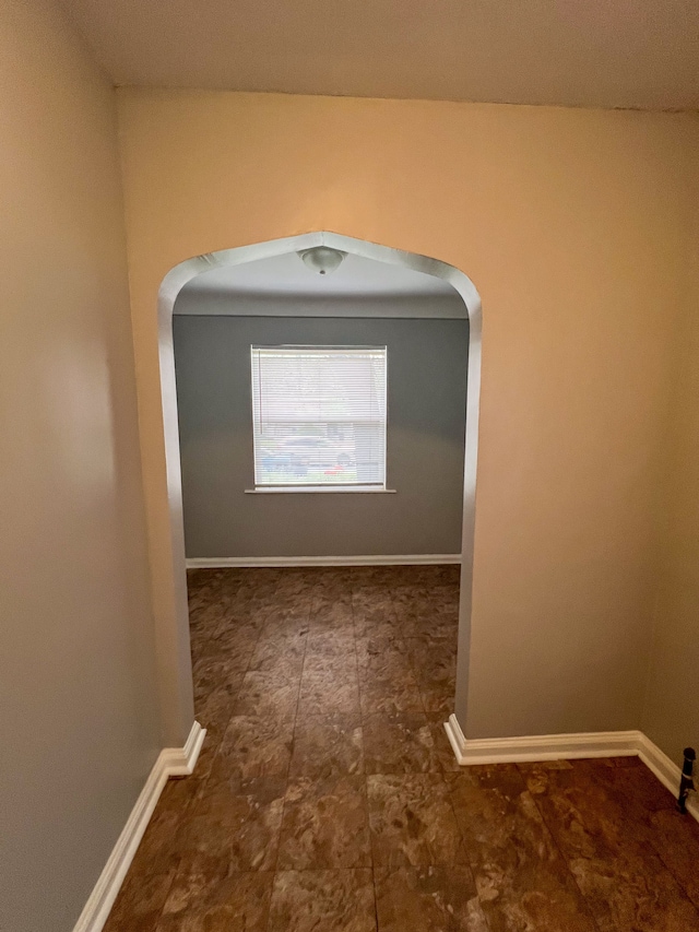 19190 Hoover St, Detroit, MI 48205 - hallway featuring arched walkways and baseboards