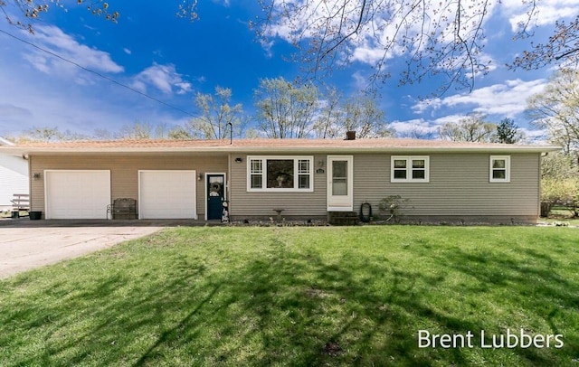 view of front of home with an attached garage, a front lawn, entry steps, and concrete driveway