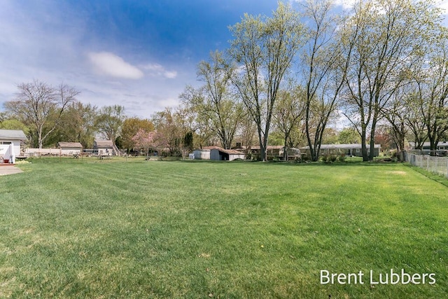 view of yard with fence