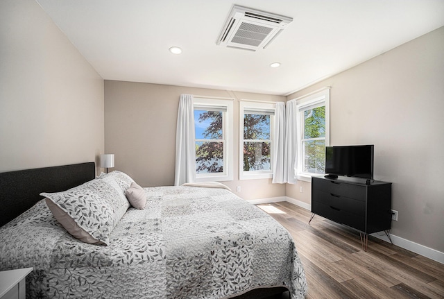 22873 Riverside Dr, Mendon, MI 49072 - bedroom featuring wood finished floors, baseboards, and recessed lighting