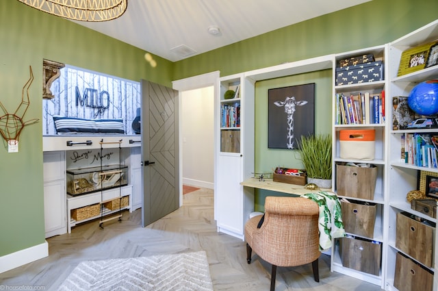 office area featuring baseboards