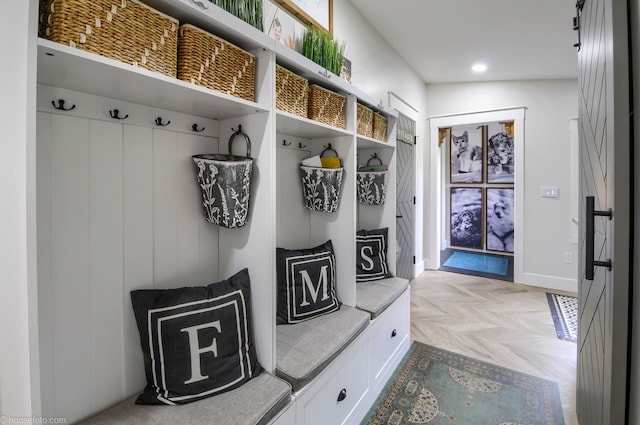 mudroom featuring baseboards and recessed lighting