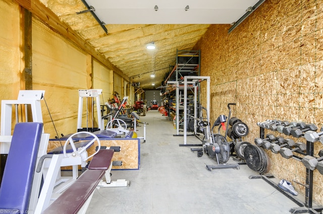 exercise room with a garage