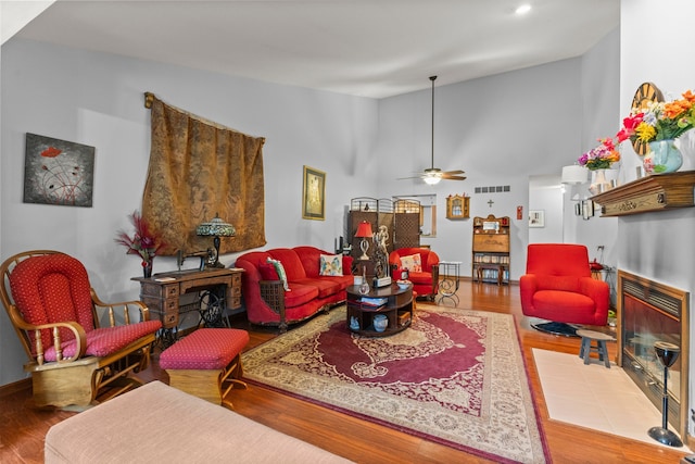 26901 Ann Arbor Trl, Dearborn Heights, MI 48127 - living room with a ceiling fan, wood finished floors, recessed lighting, and high vaulted ceiling
