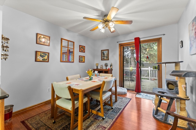 26901 Ann Arbor Trl, Dearborn Heights, MI 48127 - dining space featuring ceiling fan, wood finished floors, and baseboards