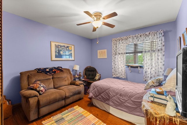 26901 Ann Arbor Trl, Dearborn Heights, MI 48127 - bedroom featuring wood finished floors and ceiling fan