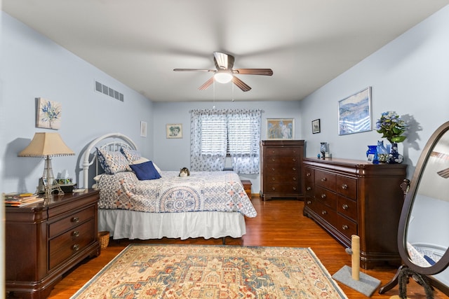 26901 Ann Arbor Trl, Dearborn Heights, MI 48127 - bedroom featuring dark wood-type flooring and ceiling fan