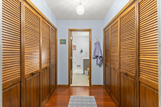 26901 Ann Arbor Trl, Dearborn Heights, MI 48127 - hallway with dark wood-style floors and baseboards